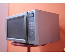 Image result for Sharp R 303Cw Manual