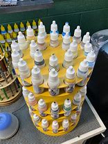 Image result for Rotating Paint Rack