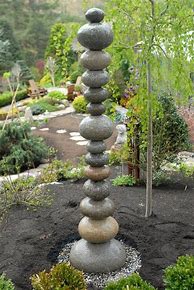 Image result for Pebble Sculpture Ideas