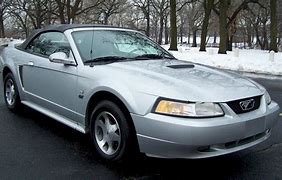 Image result for 2000 silver ford mustang convertibles