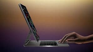 Image result for Apple iPad and Magic Keyboard