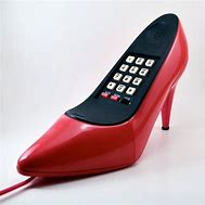 Image result for Sounders Holding Shoe as Phone