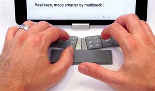 Image result for Portable Keyboard Typing