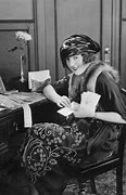 Image result for Business Woman On Desk