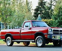 Image result for First Gen Cummins Dually Red