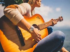 Image result for Girl Playing Guitar