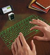 Image result for New iPhone Laser Keyboard