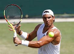 Image result for Nadal Playing Tennis