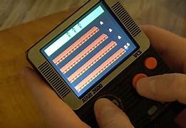 Image result for Atari Mobile Game Device