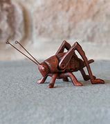 Image result for Iron Cricket Yard Decoration