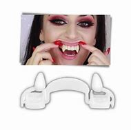 Image result for Retractable Vampire Fangs
