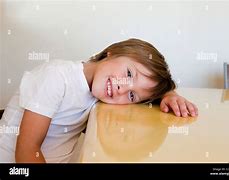 Image result for Kids Laying On a Table