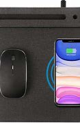 Image result for Apple Mouse Pad Charging