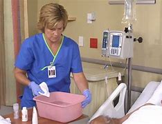 Image result for Doctors/Nurses Bathing Patient