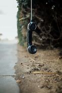 Image result for Telephone Hanging