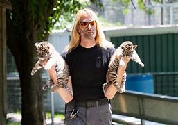 Image result for Tiger King Zookeeper Erik Cowie