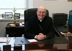 Image result for Bishop at His Desk
