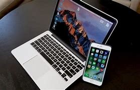 Image result for Apple iPhone and MacBook