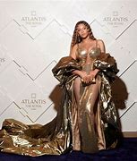 Image result for Beyoncé Red Carpet Gold Dress