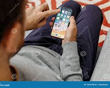 Image result for Person Holding iPhone