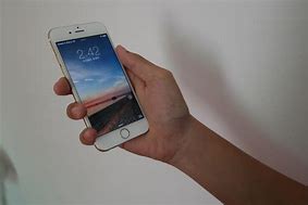 Image result for iPhone in Hand Pic Back Side