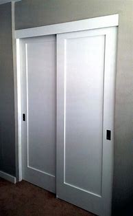 Image result for Wood Bypass Closet Doors