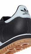 Image result for Adidas Rom Triner's
