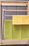 Image result for Fold Down Wall Mounted Laundry Drying Rack