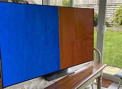 Image result for 85 Inch TV to Man