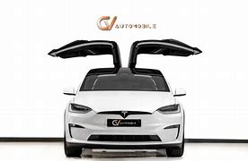 Image result for tesla x gold