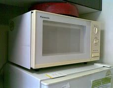 Image result for Sharp R 209 Microwave