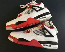 Image result for Fake Air Jordan 4