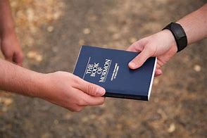 Image result for Holding the Book of Mormon in General Conference