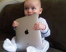 Image result for Child Holding iPad