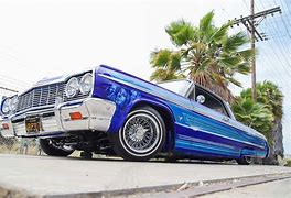 Image result for Blue 64 Impala Lowrider