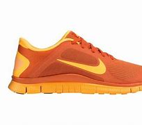Image result for Orange Accents Nike Shoes