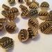 Image result for Coned Half Round Old Gold Buttons