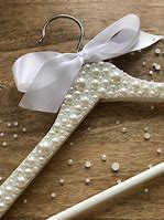 Image result for Fancy Hangers White Riystons