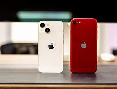 Image result for iPhone 13 Mini Next to iPhone SE