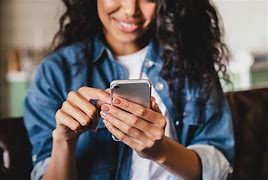 Image result for Happy Person Looking at Phone