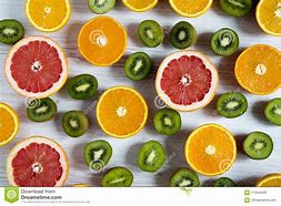 Image result for Fruit Flat Lay Photography Orange and Kiwi