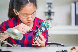 Image result for Girl Building Robotic Car