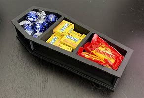 Image result for Coffin Shaped Desk Tidy