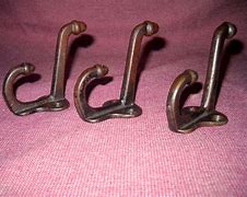 Image result for Cast-Bronze Closet Hangers