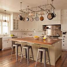 kitchen island with pot rack interior design inspiration photos by tim barber kitchen island with pot rack interior design inspiration photos by tim barber