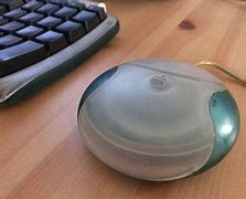 Image result for Apple Hockey Puck Mouse