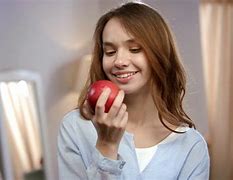 Image result for Girl Eating Apple