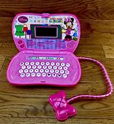Image result for Wednesday Laptop Toy Mouse
