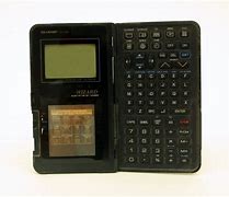 Image result for Sharp Oz Electronic Organizer