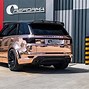 Image result for Evoque Black and Rose Gold Car Wrap